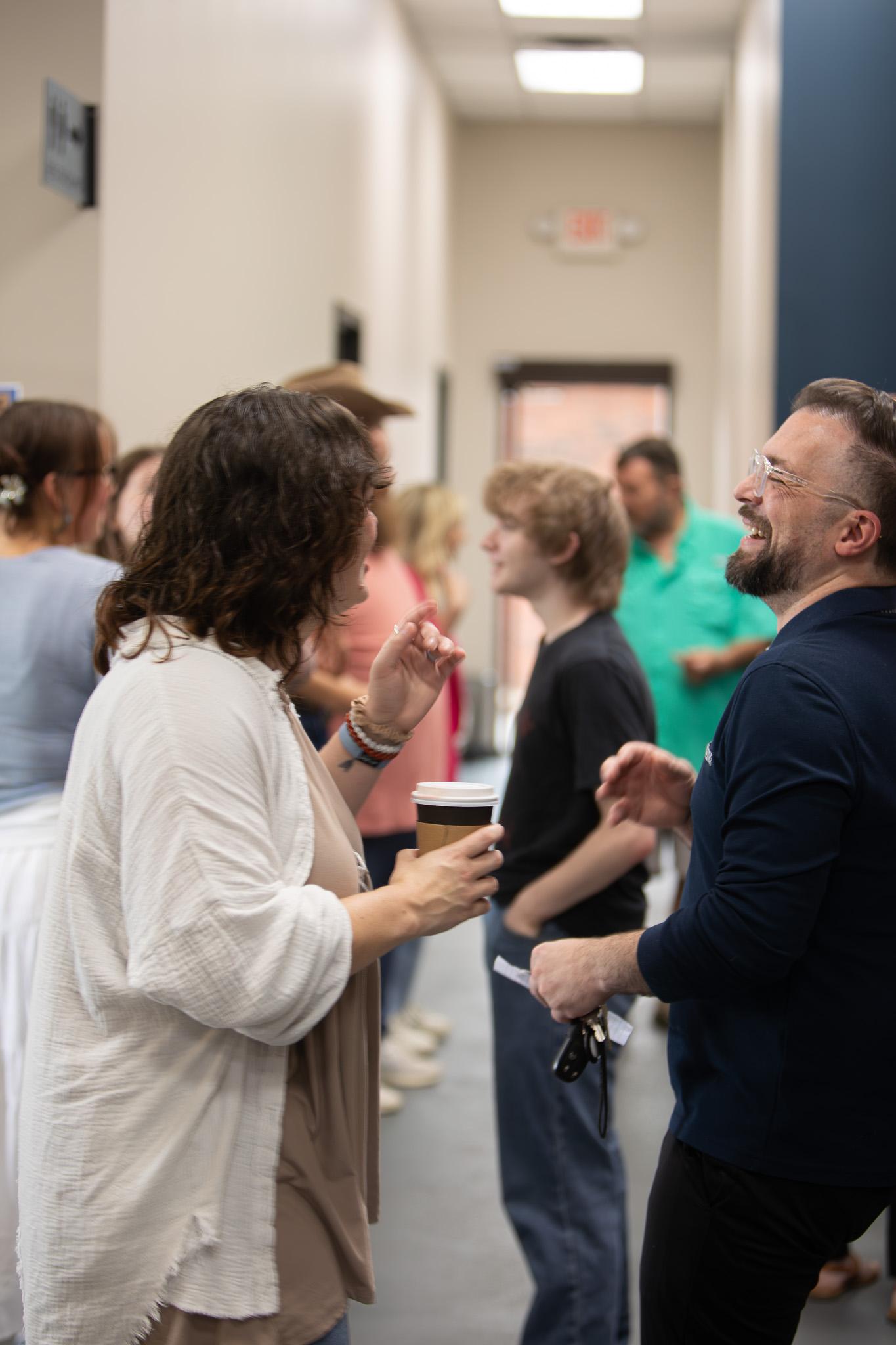 Friends connecting after a Good News Co. gathering.